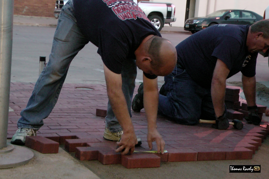 Jamestown Fire Dept install commemorative bricks at firefighter statue Sept 24, 2014
